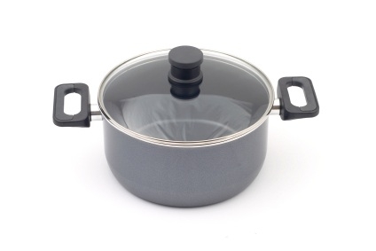 Pack pans and dishware in the kitchen moving box